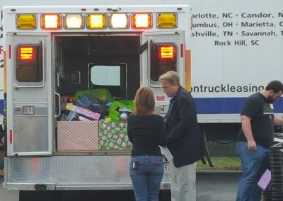 FireFighters 4 Kids Unloading an Ambulance